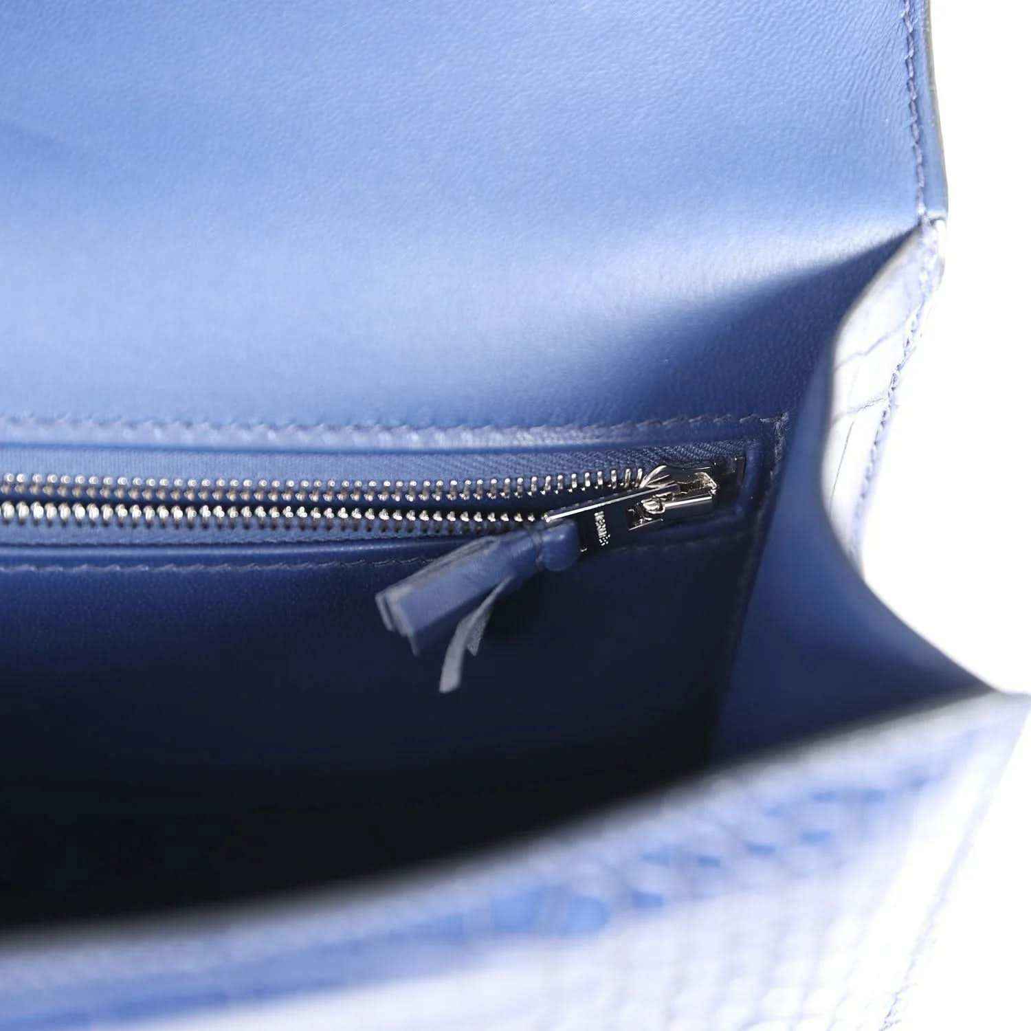 Blue handbag zipper pocket with metal zipper and zipper pull