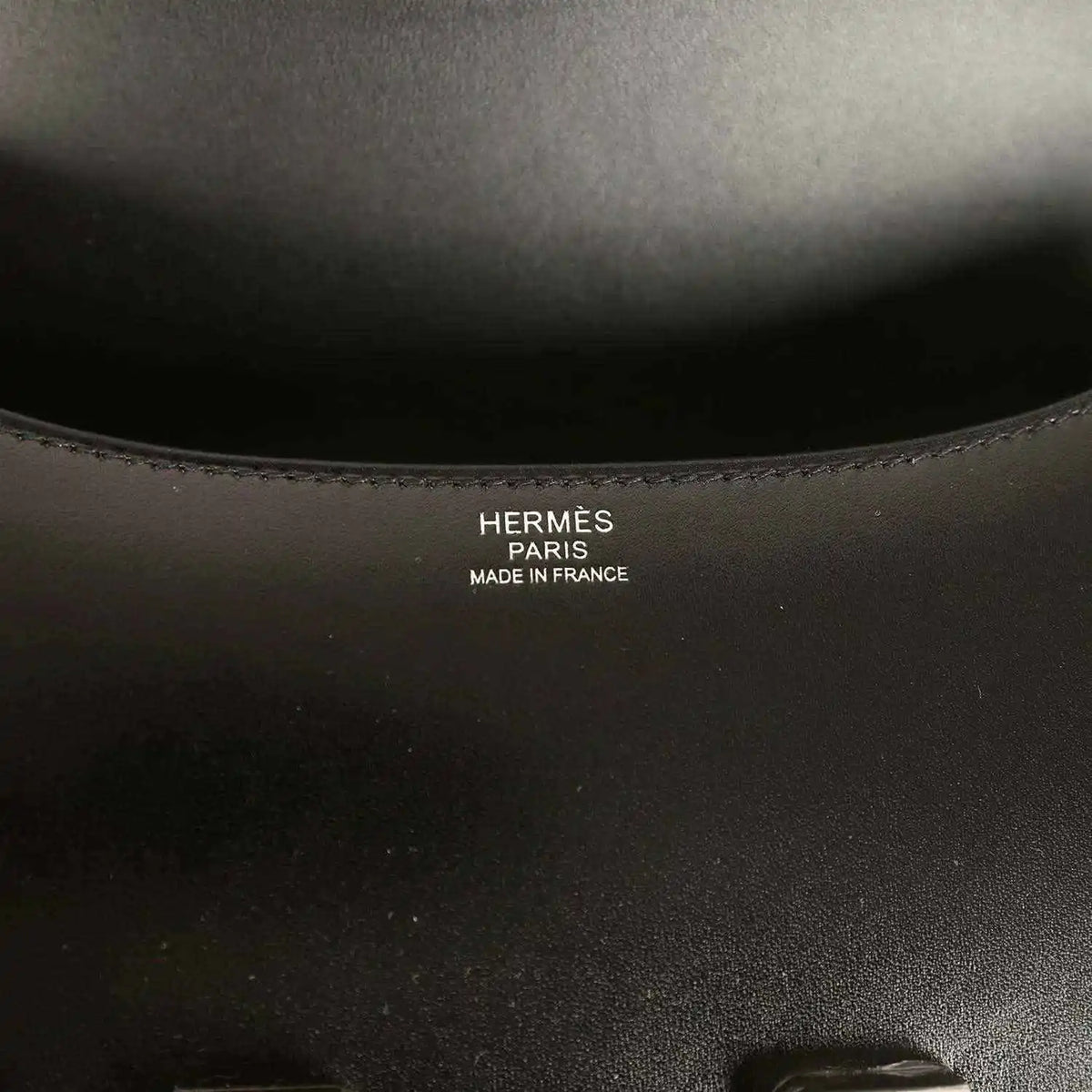 Black leather bag interior stamp: HERMÈS PARIS MADE IN FRANCE