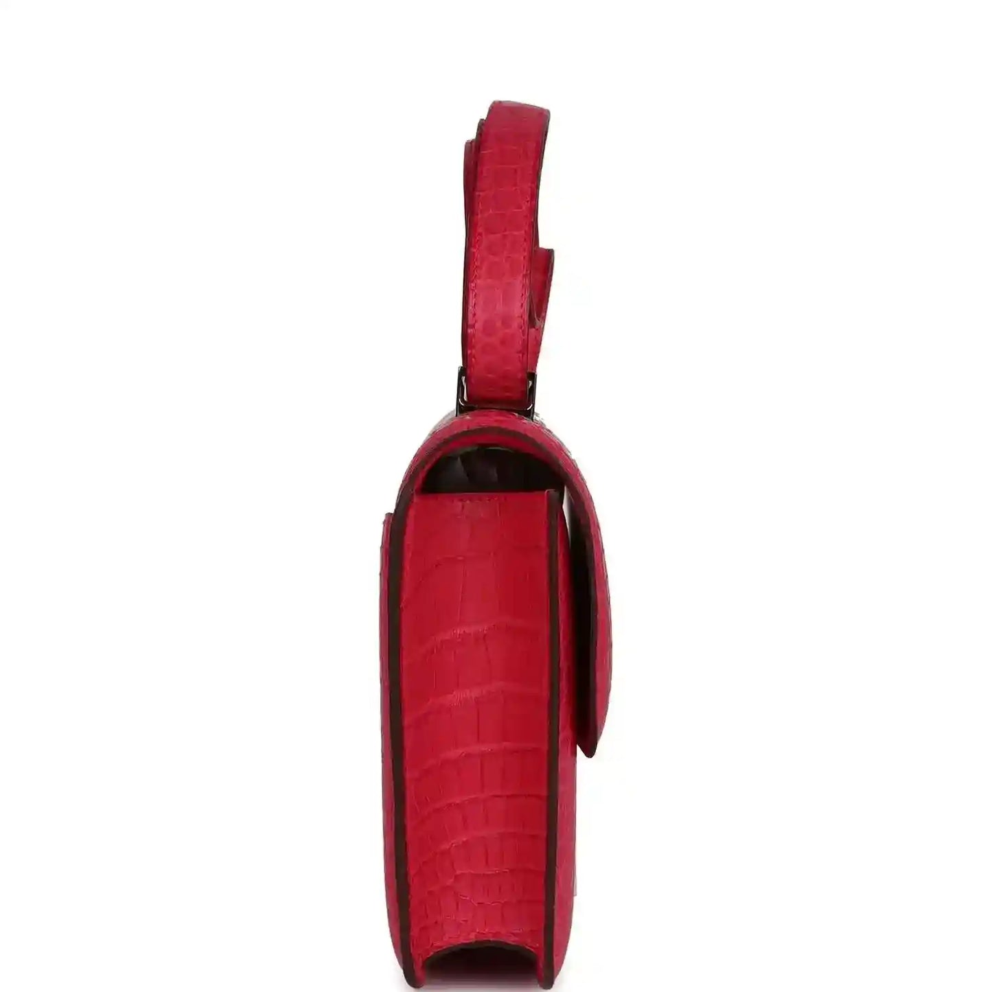Constance bag, red matte alligator, side view with handle strap and edge stitching