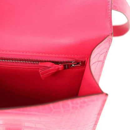 Constance bag interior zip pocket with tassel pull and metal zipper