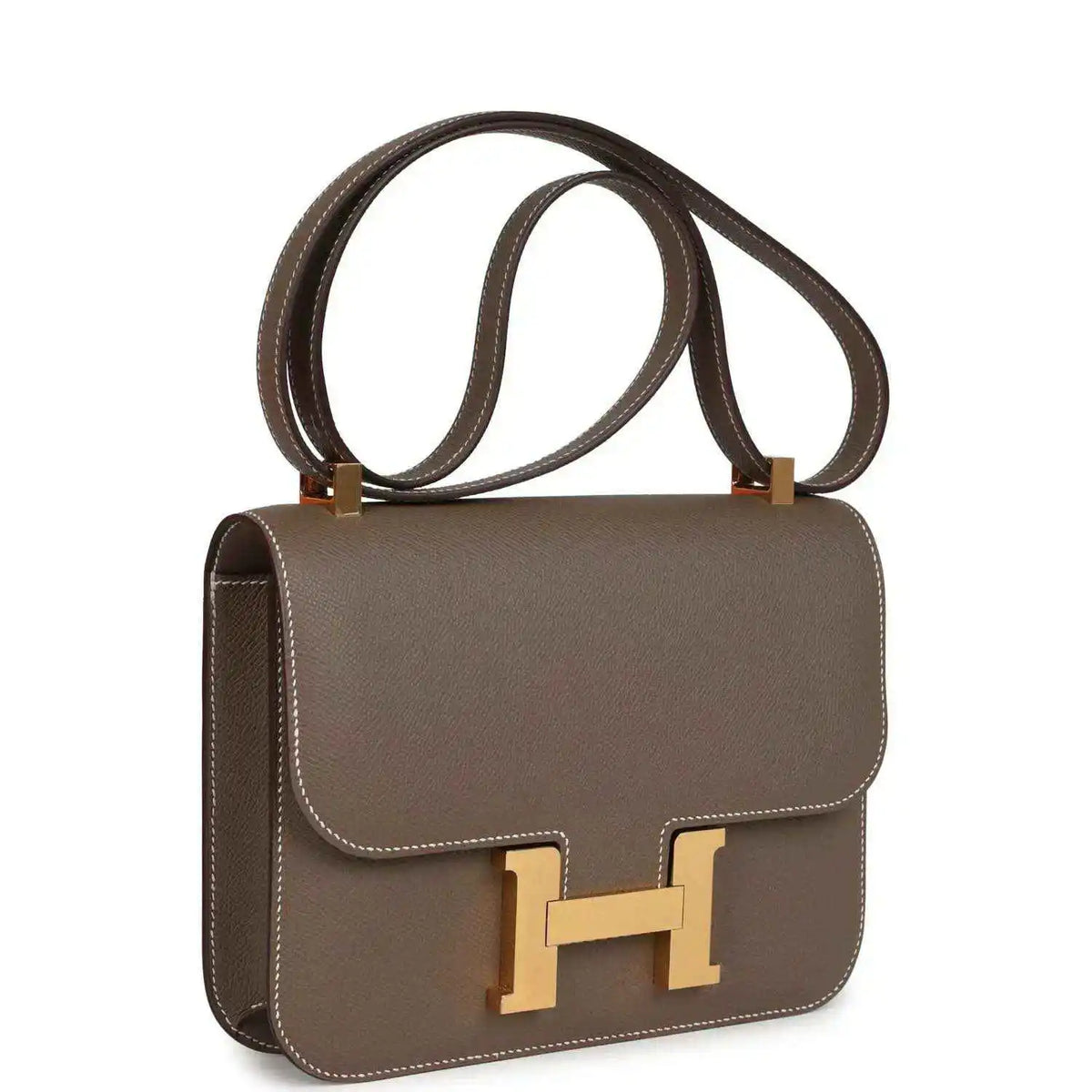 Taupe Epsom leather shoulder bag with flap, gold H clasp, and top handle straps