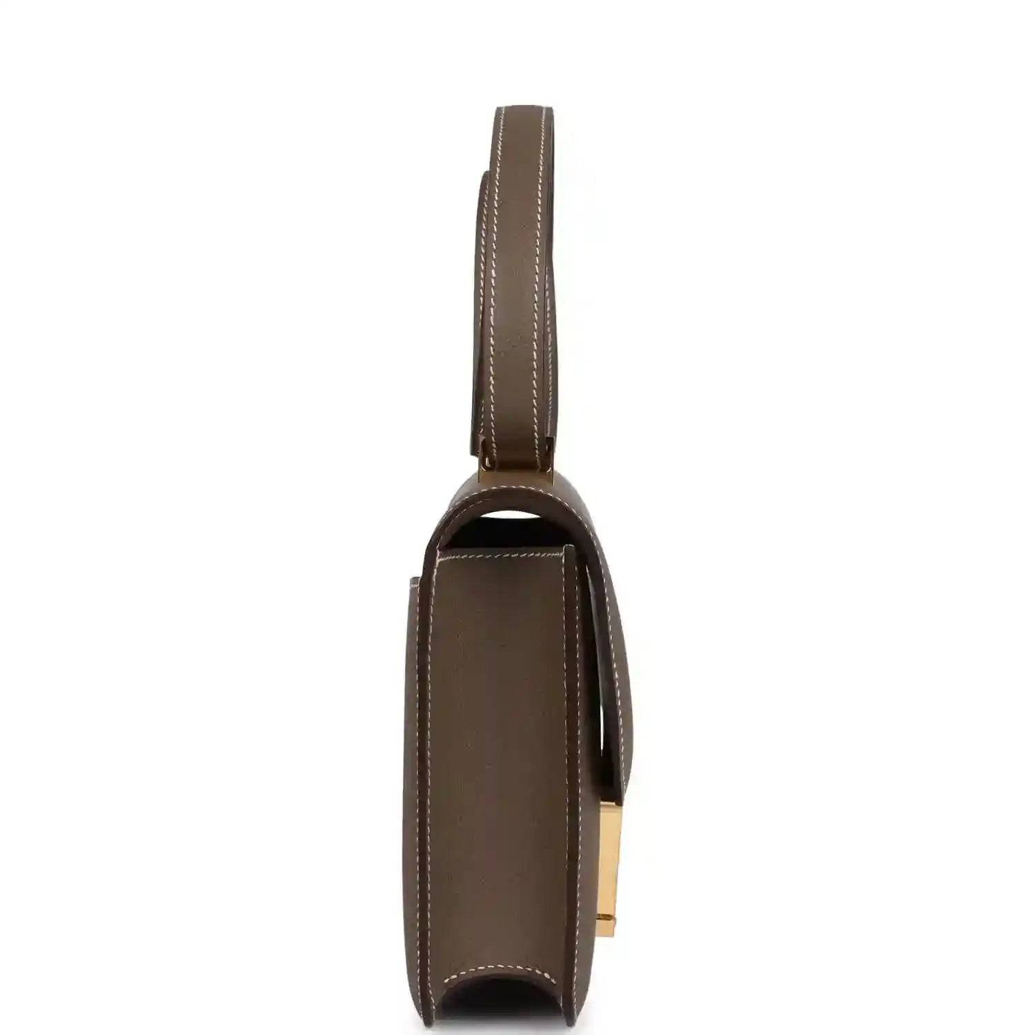 Taupe leather shoulder bag side view with slim strap and gold hardware detail