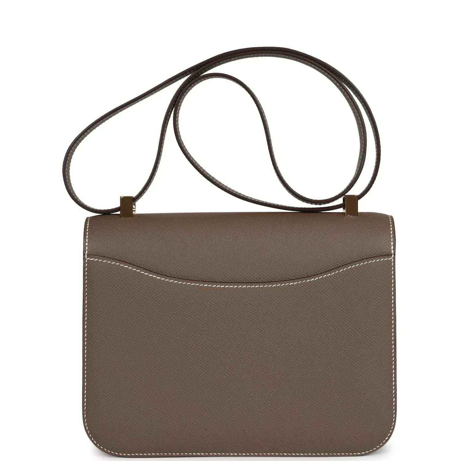 Taupe leather mini shoulder bag with flap, double straps, and stitched trim