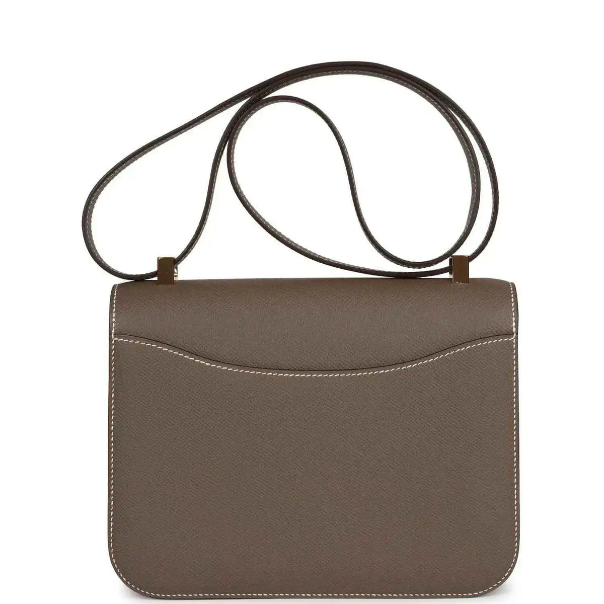Taupe leather mini shoulder bag with flap, double straps, and stitched trim