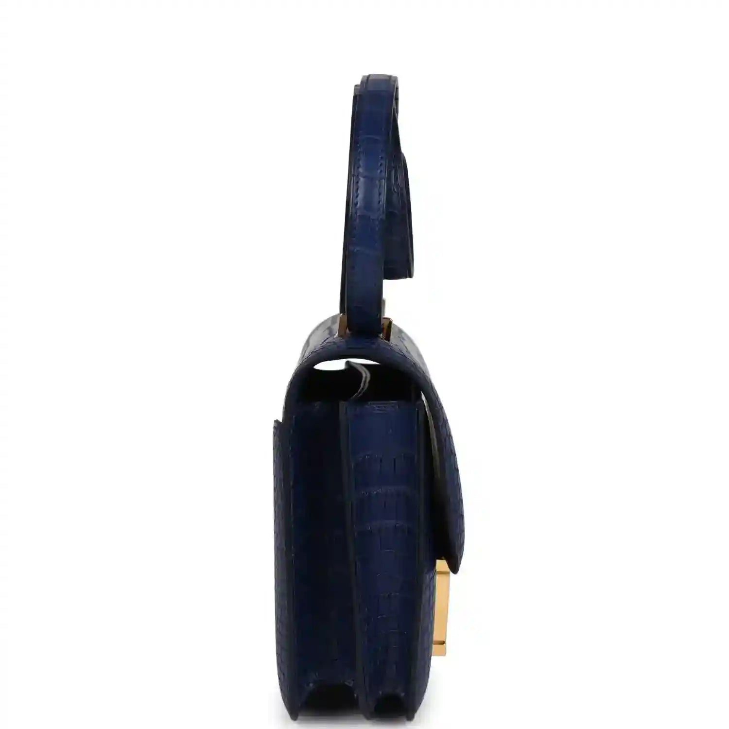 Blue alligator-style bag side view with gold hardware and structured flap