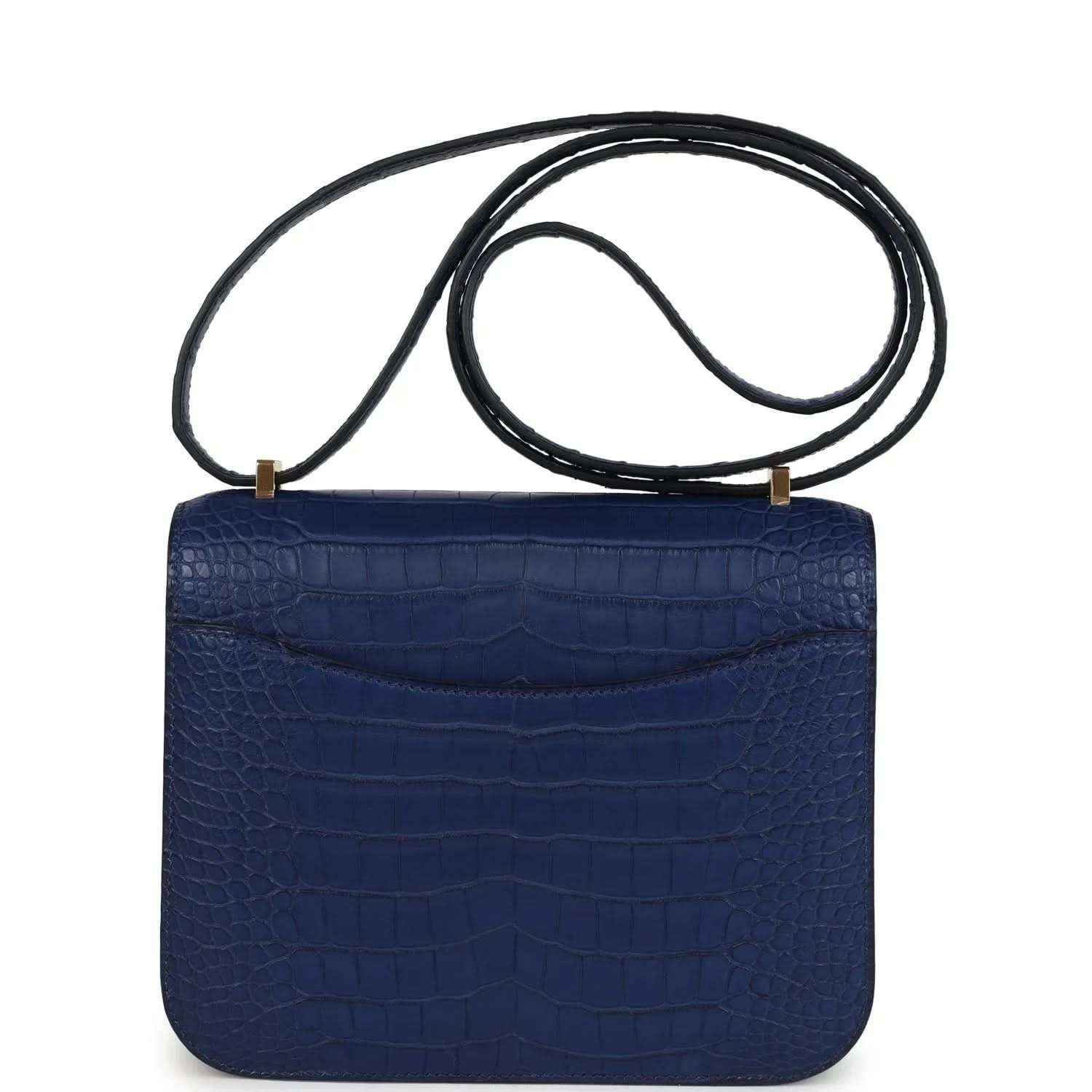 Blue alligator-style flap bag with top handle strap, front clasp not shown