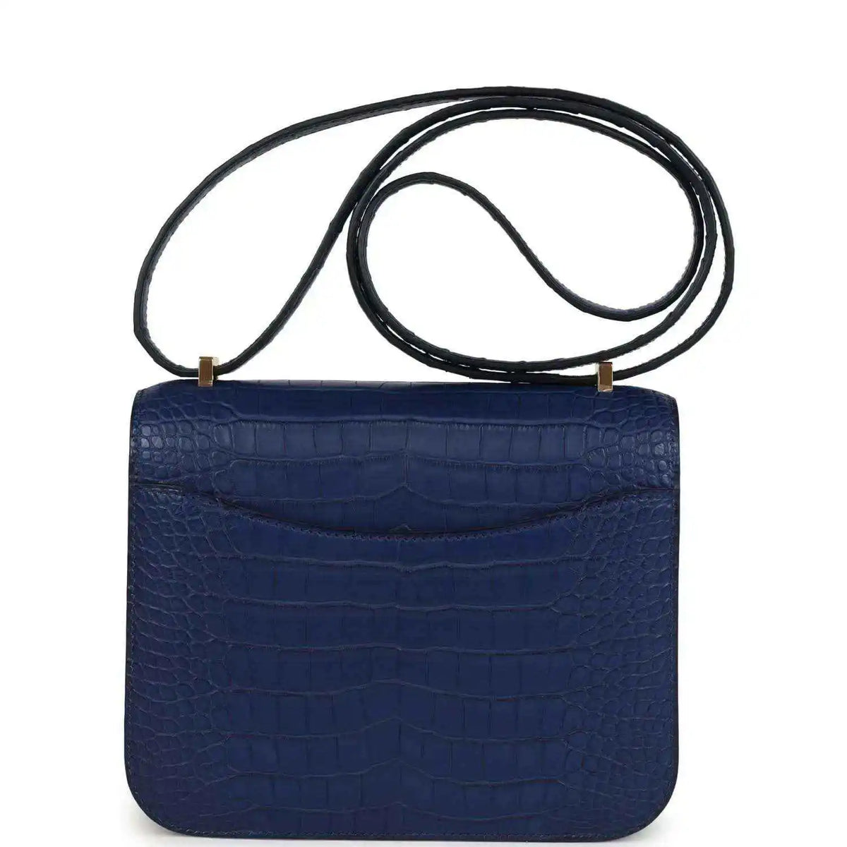 Blue alligator-style flap bag with top handle strap, front clasp not shown
