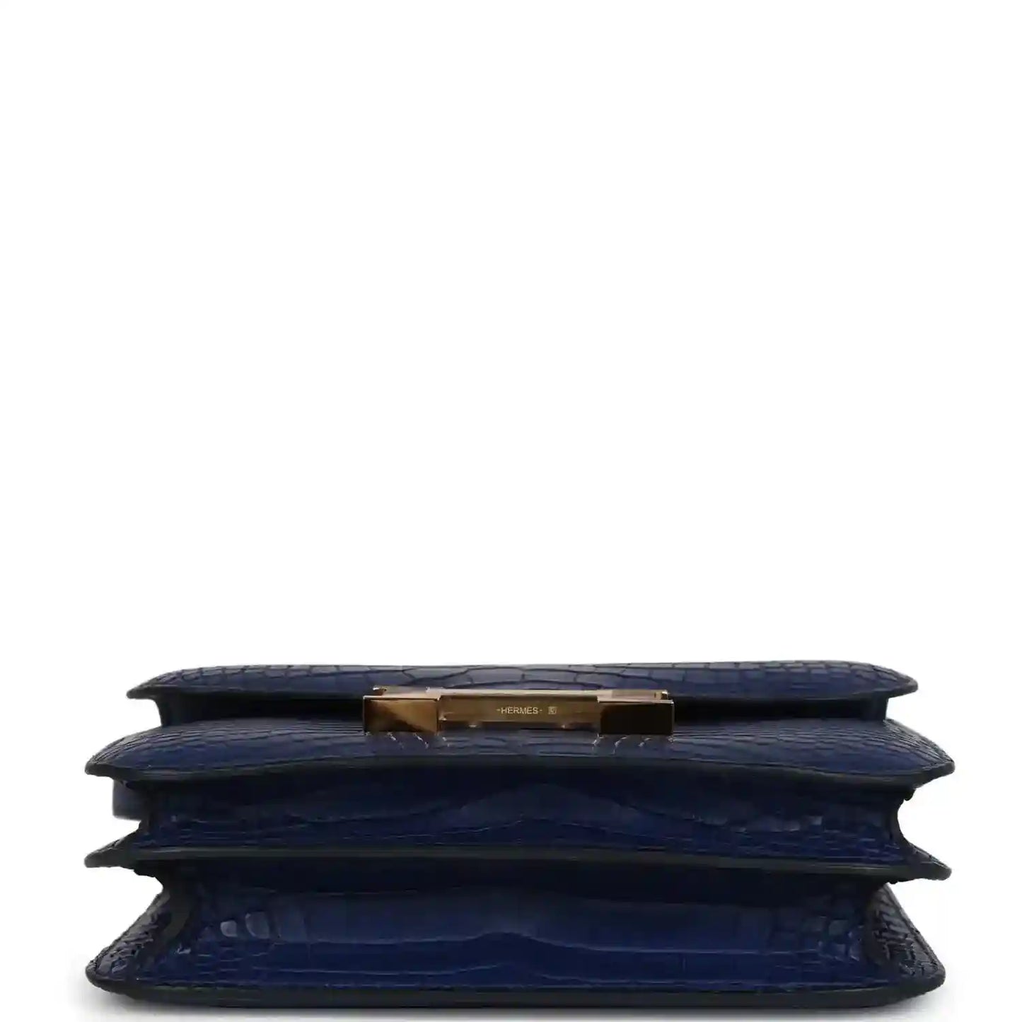 Blue alligator-style bag bottom with gold top hardware and layered folds