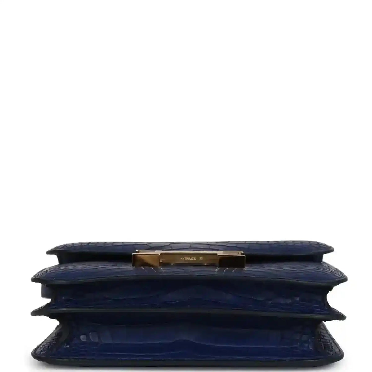 Blue alligator-style bag bottom with gold top hardware and layered folds