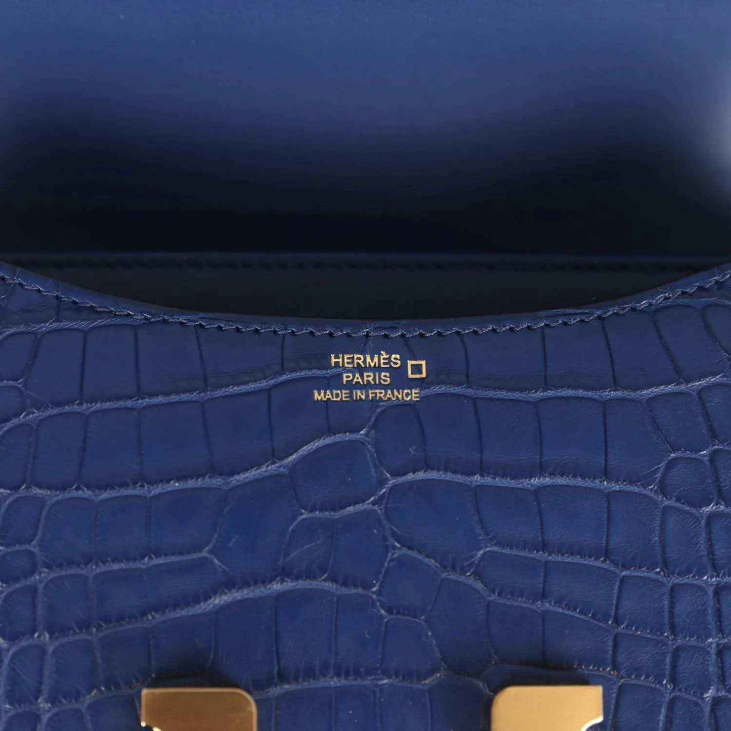 Blue alligator-style leather lining with HERMÈS Paris maker stamp