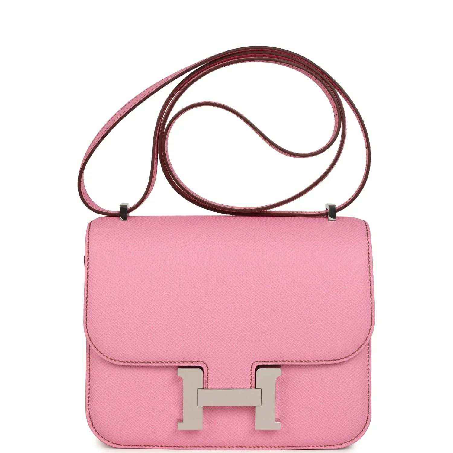 Pink leather crossbody bag with flap, H clasp, and top handle strap