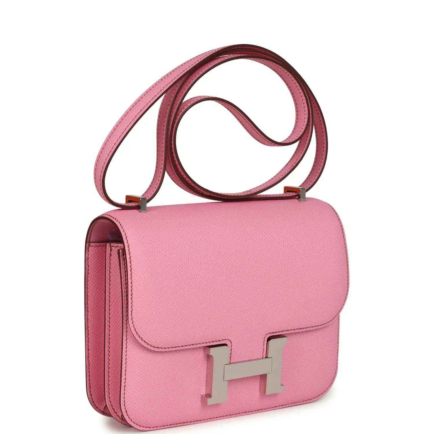 Pink leather shoulder bag with front flap, H clasp, and side handle strap