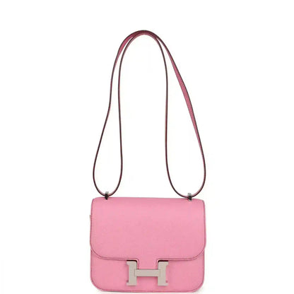 Pink leather crossbody bag with flap and H clasp, long shoulder strap