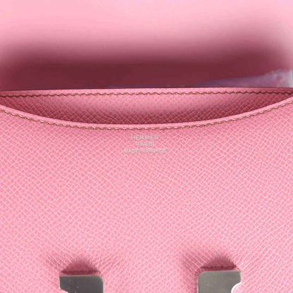 Pink Epsom leather flap lining close-up with stitching and Hermes logo