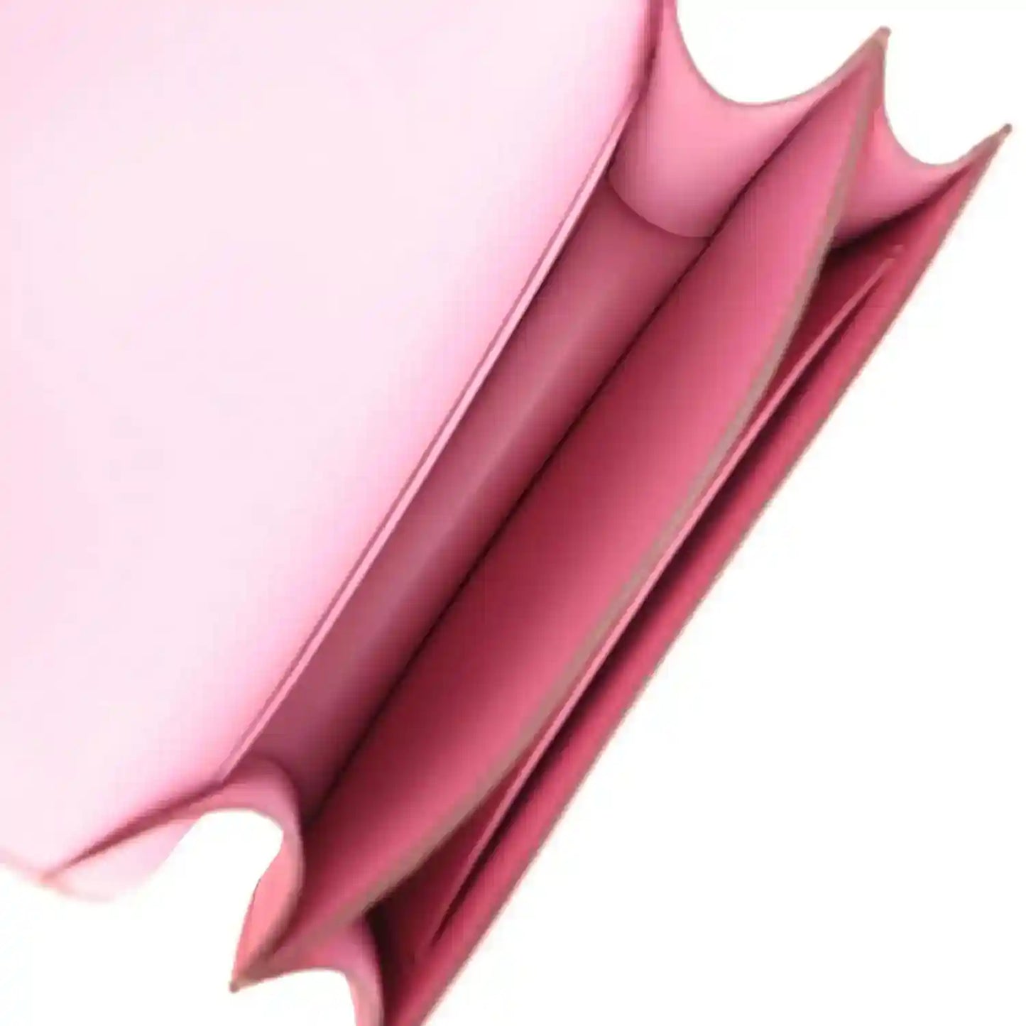 Pink leather interior view with stitched side panels and open top edge
