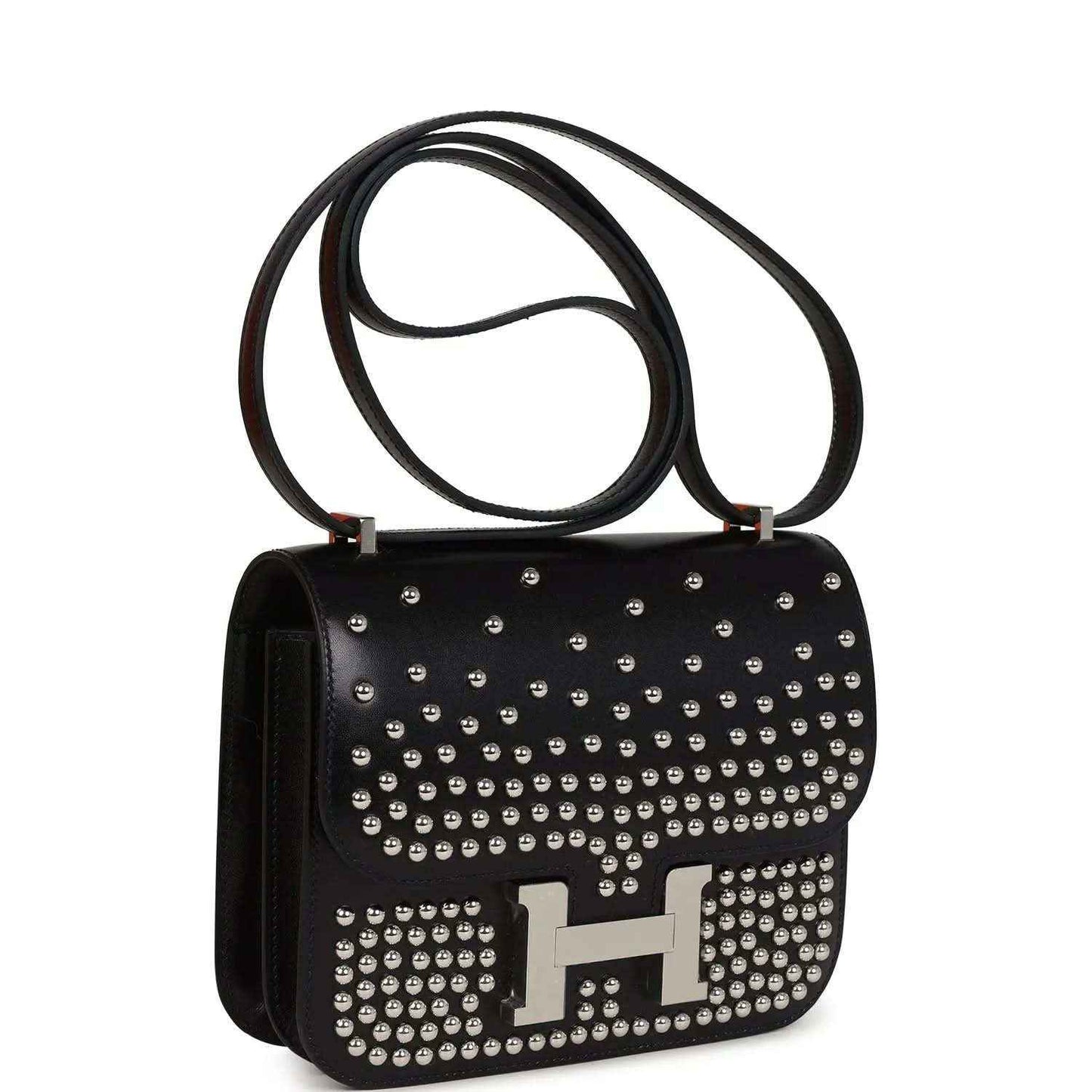 Black studded leather handbag with top handle, metal H clasp detail