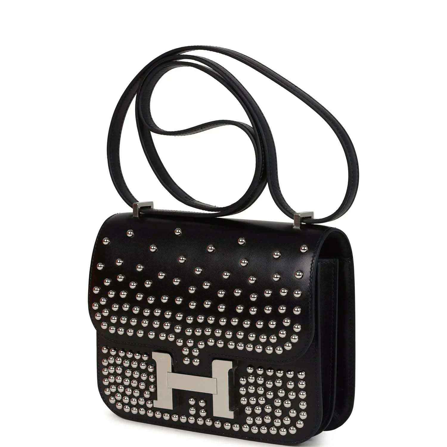 Black studded leather handbag with top handle, metal H clasp and studs