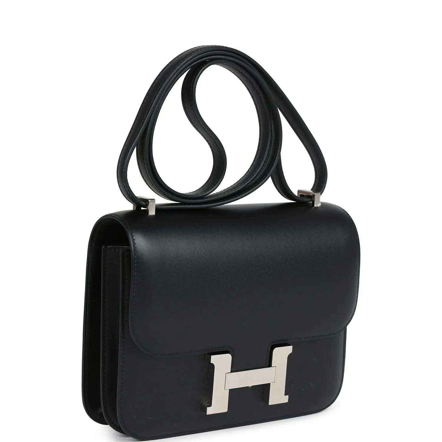 Hermes Constance 18 bag, black leather flap with Palladium H clasp, side profile