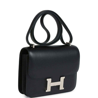 Hermes Constance 18 bag, black leather flap with Palladium H clasp, side profile