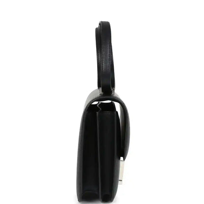 Hermes Constance 18 bag, black leather end view with strap and Palladium H hardware