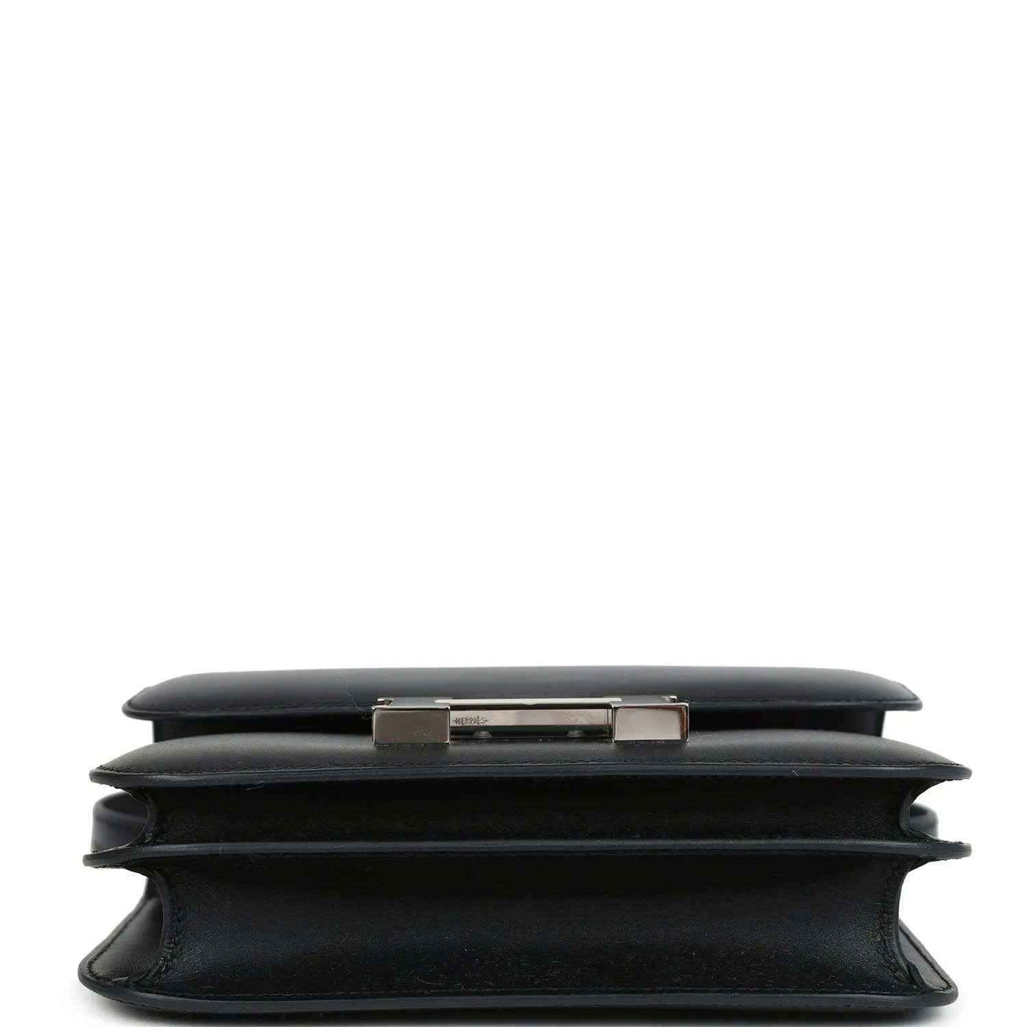 Hermes Constance 18 bag, black leather top and side profile with clasp bar detail