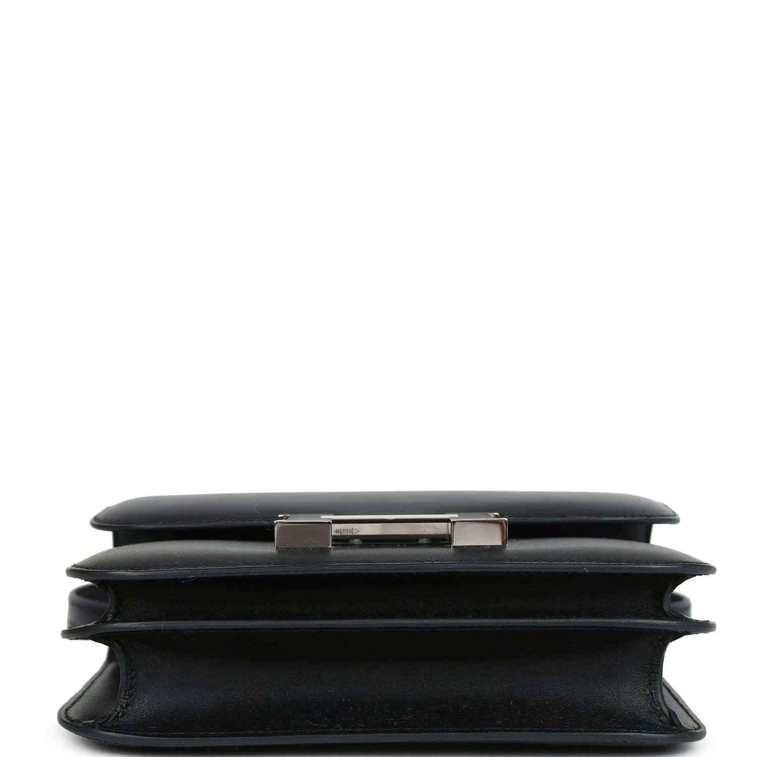 Hermes Constance 18 bag, black leather top and side profile with clasp bar detail