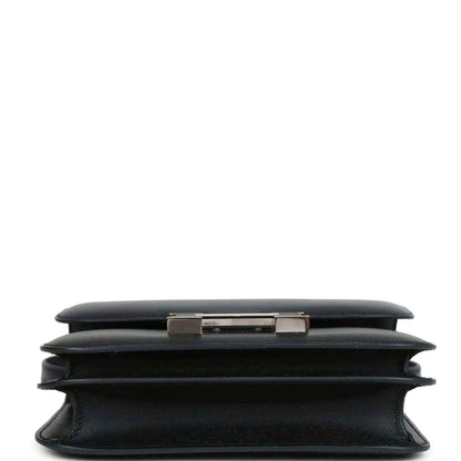 Hermes Constance 18 bag, black leather top and side profile with clasp bar detail