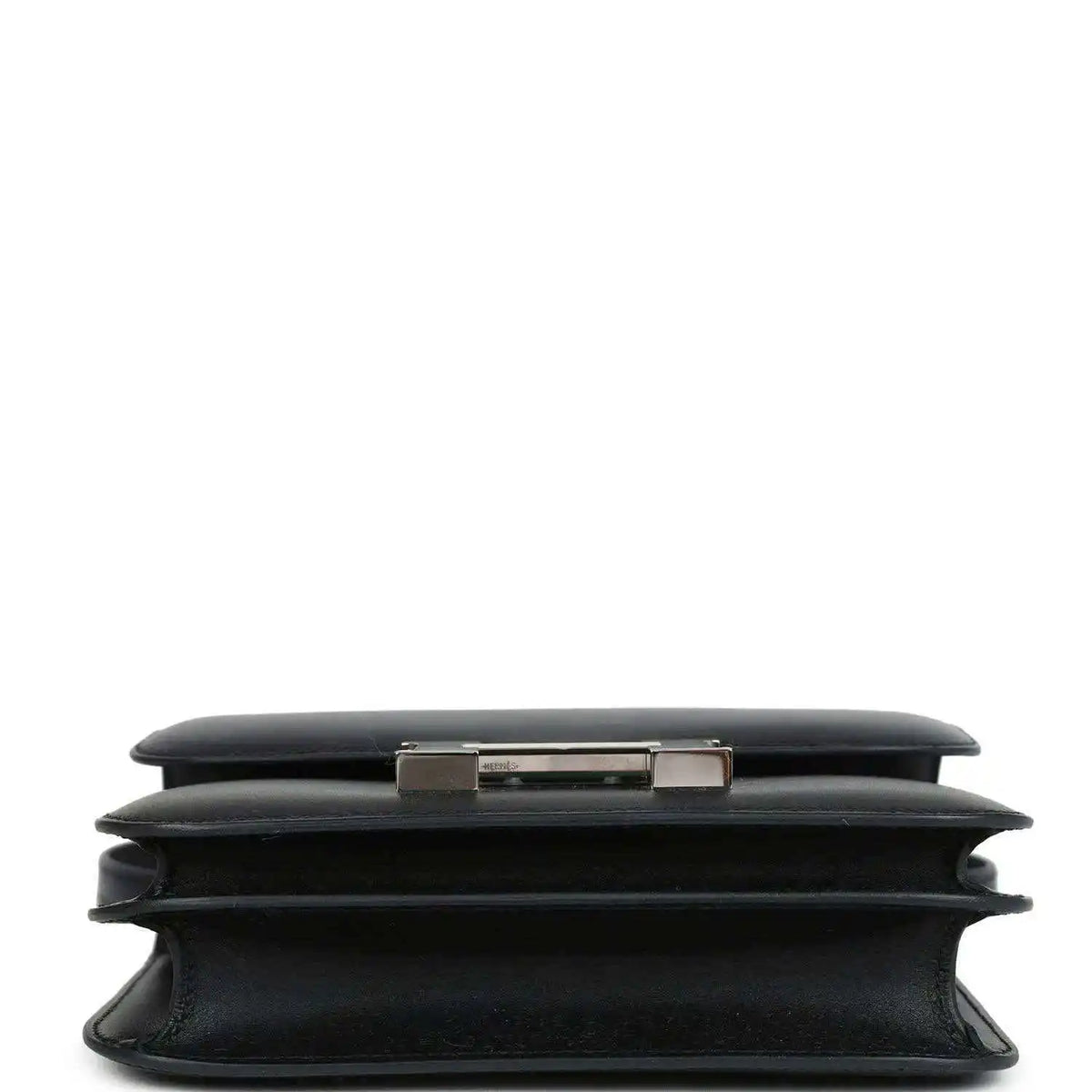 Hermes Constance 18 bag, black leather top and side profile with clasp bar detail