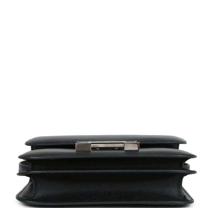 Hermes Constance 18 bag, black leather top and side profile with clasp bar detail