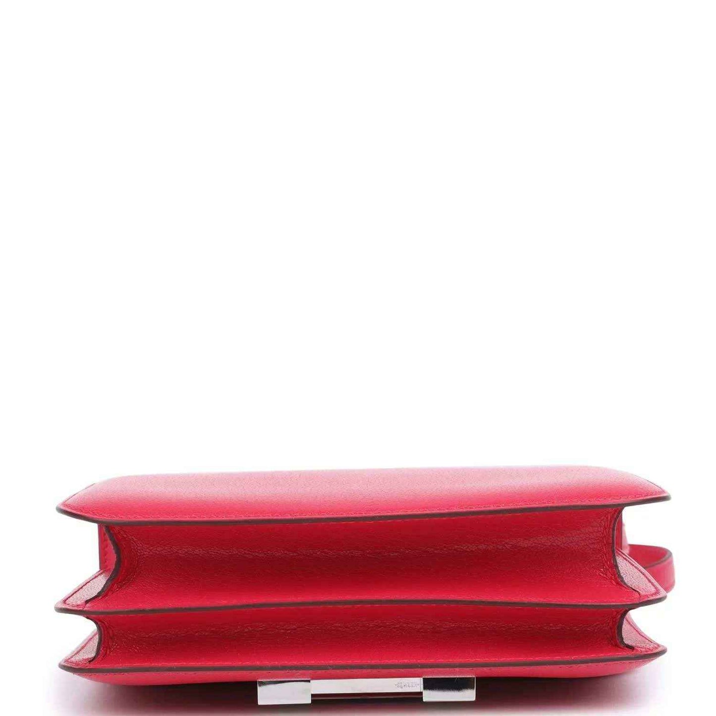 Hermes Constance 18 bag close-up of bag bottom edge in rose pink leather with seams