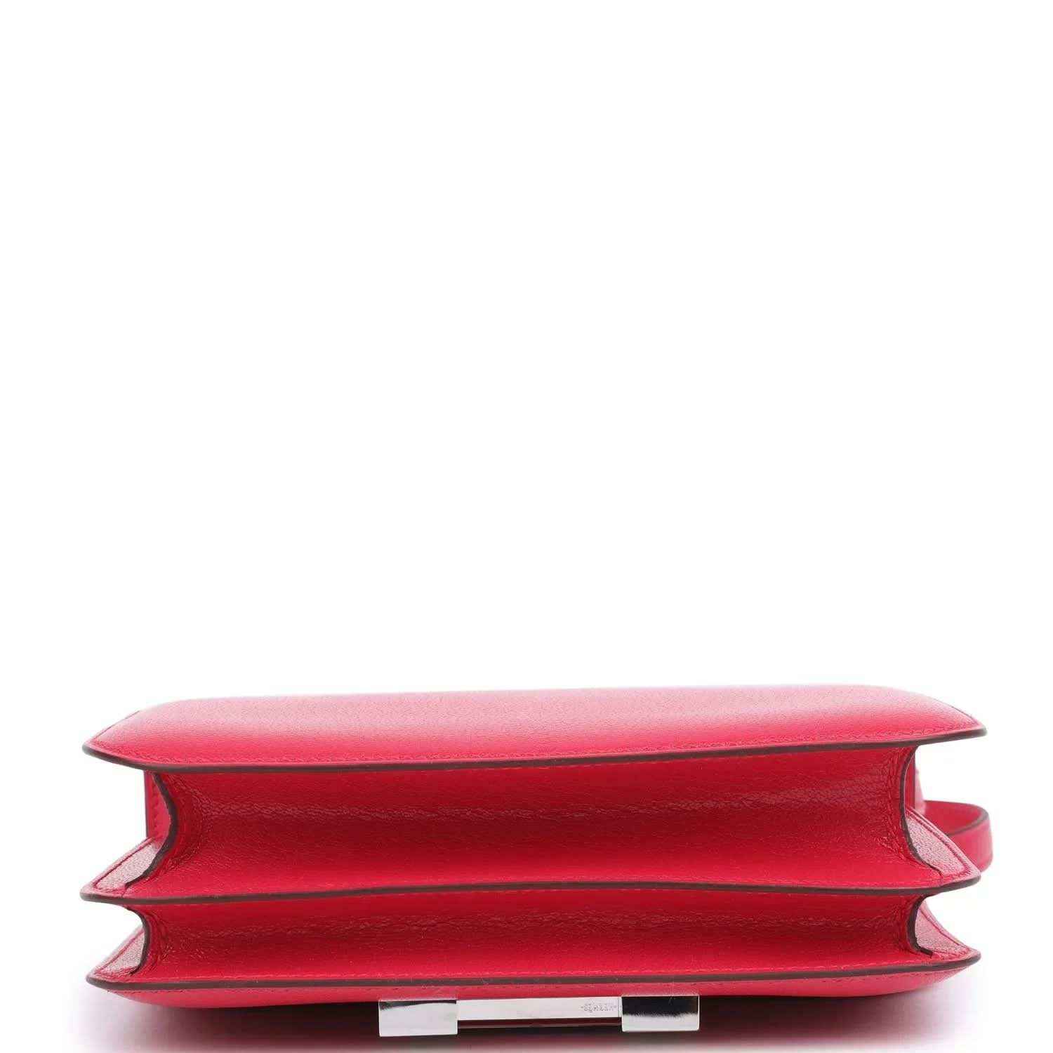 Hermes Constance 18 bag close-up of bag bottom edge in rose pink leather with seams