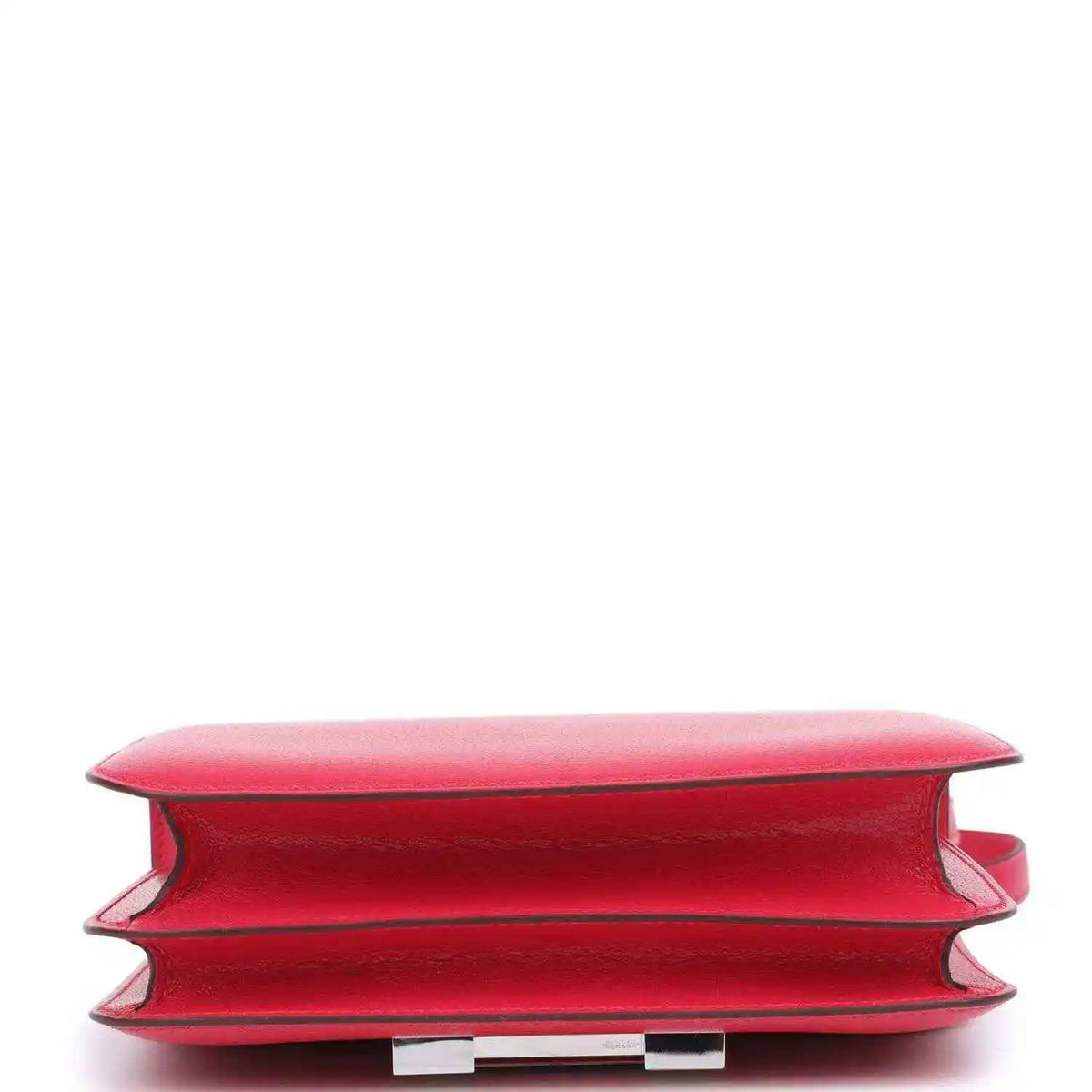 Hermes Constance 18 bag close-up of bag bottom edge in rose pink leather with seams
