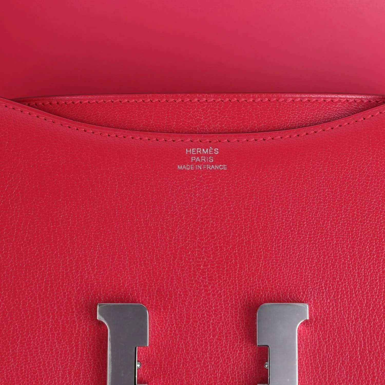 Hermes stamped interior leather lining with metal H hardware on rose pink bag