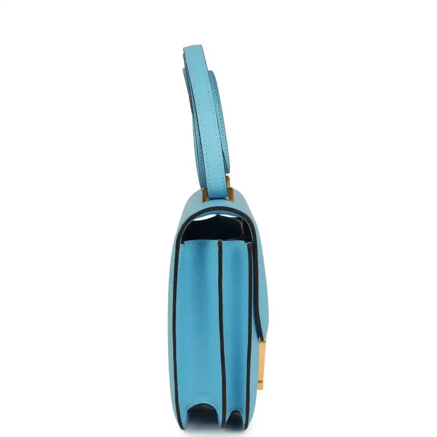 Mini crossbody bag side view in light blue leather with gold trim and hardware