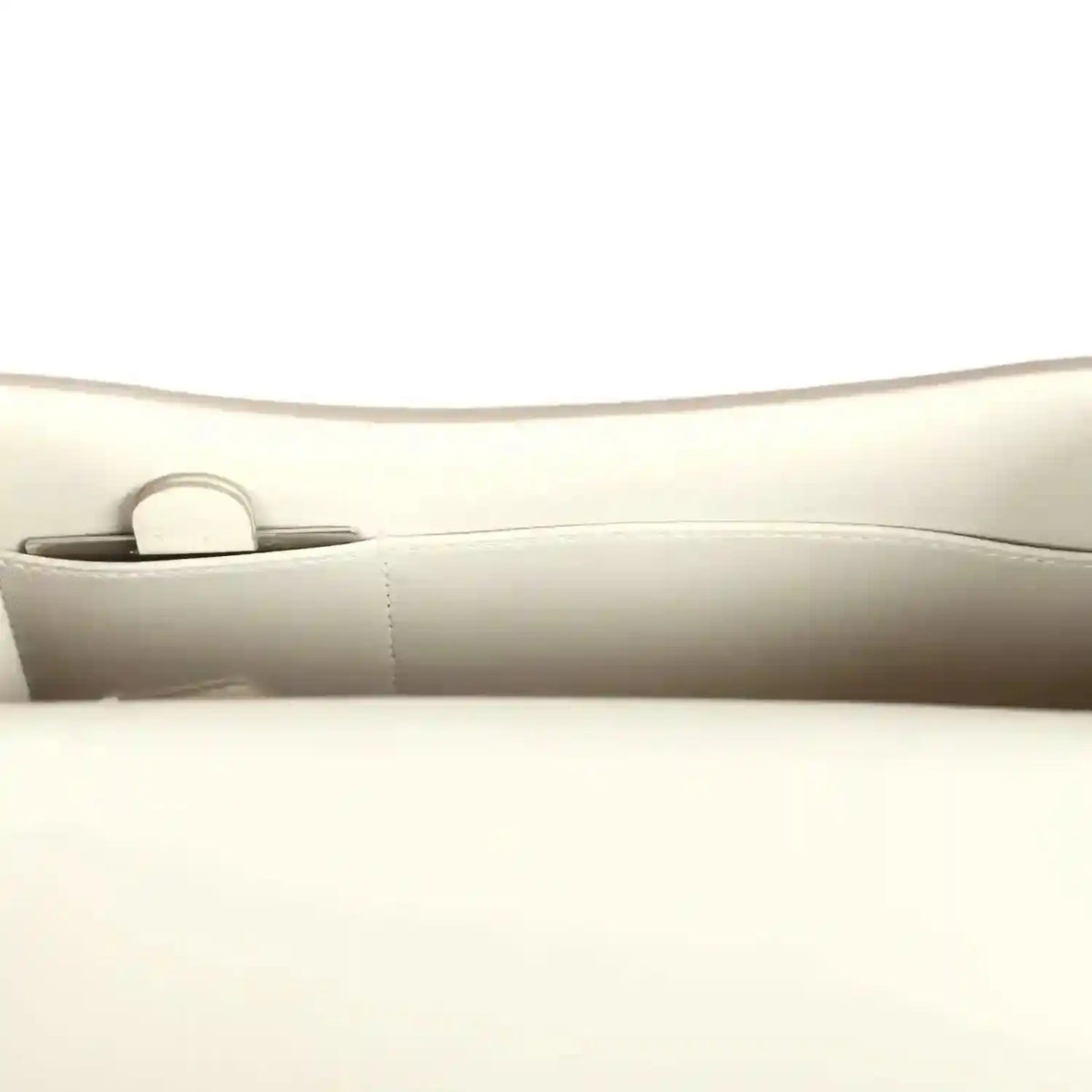 Hermes Constance handbag in cream leather with top flap and strap loop, metal hardware