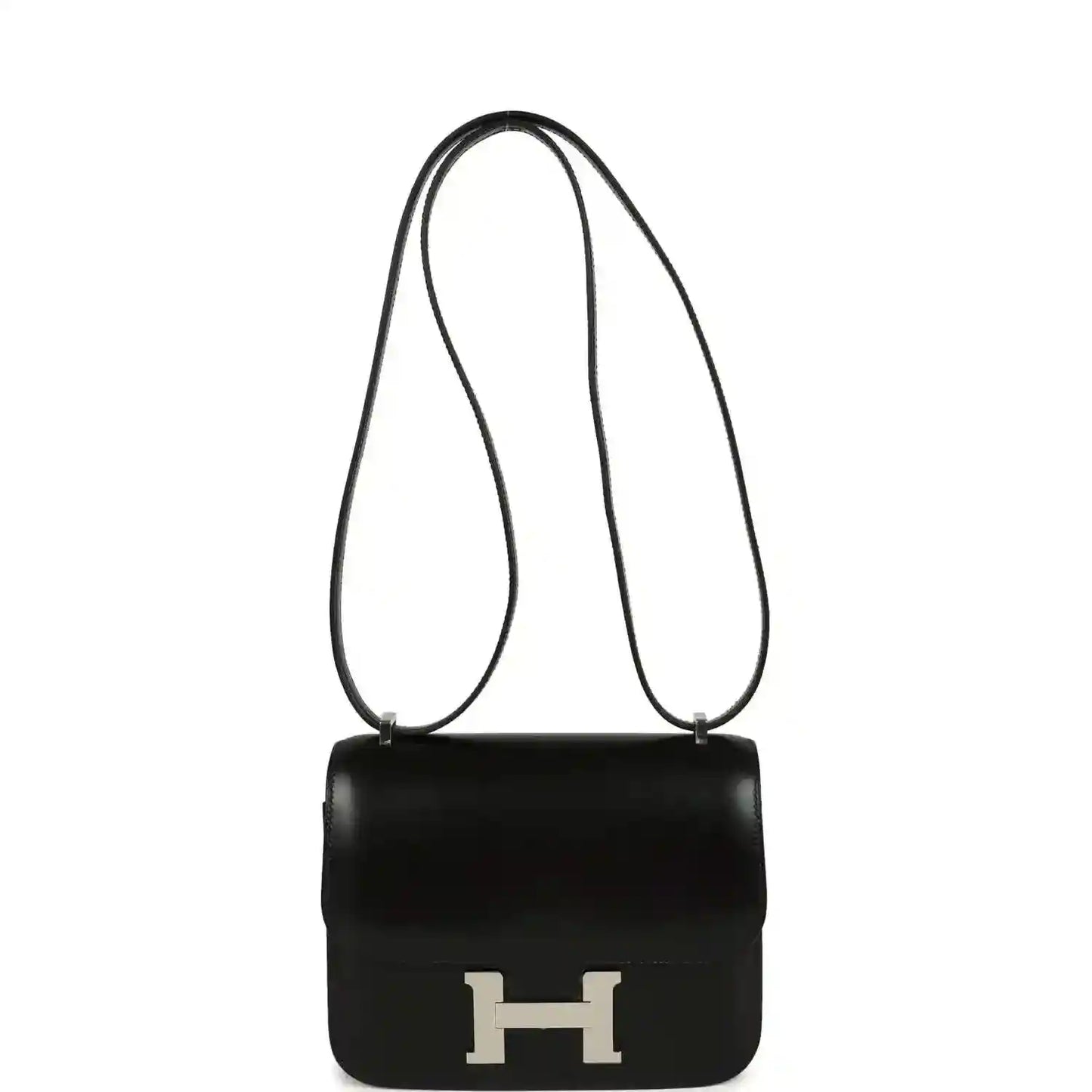 Black calfskin crossbody bag with top handle, long strap, and front H clasp.