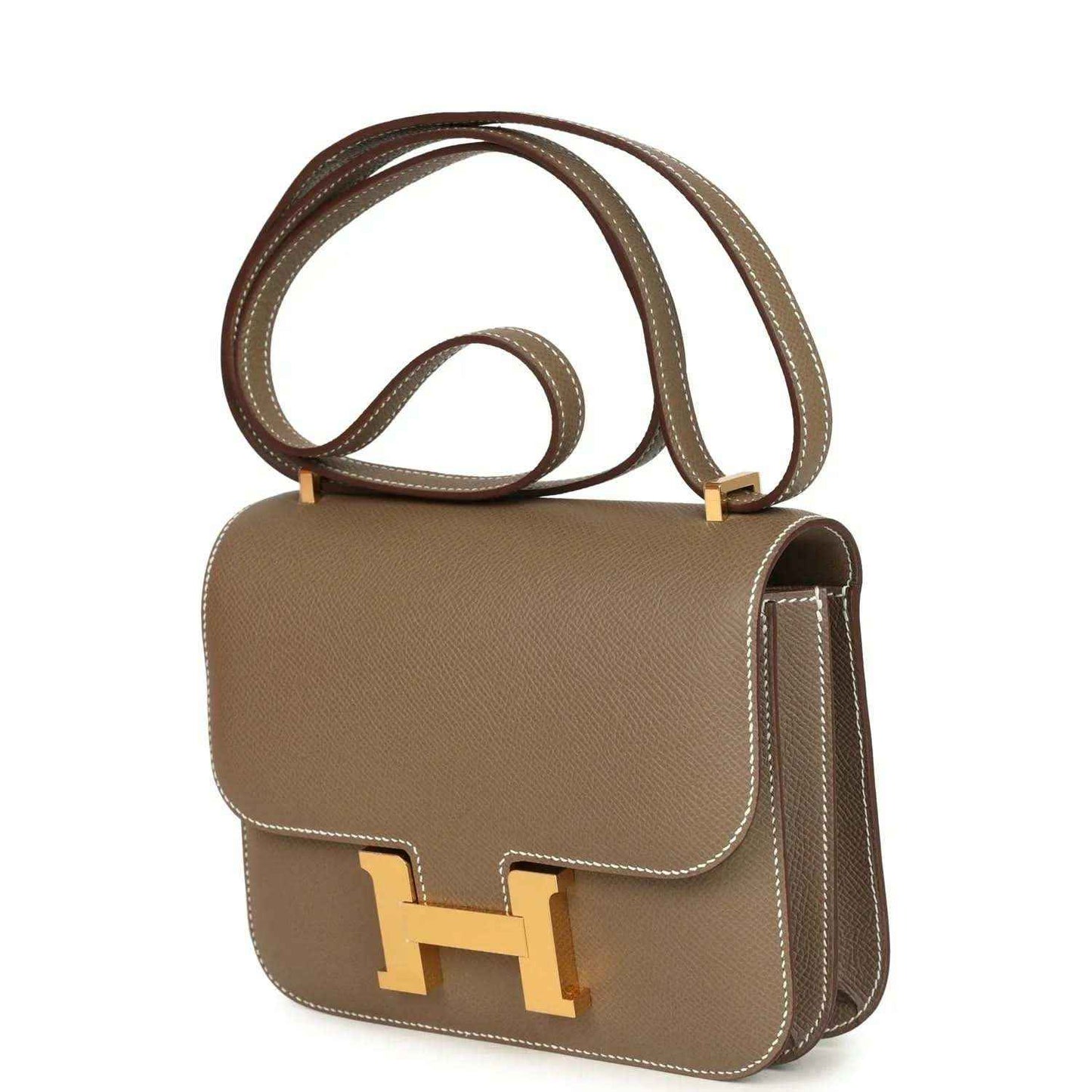 Etoupe Constance 18 crossbody bag with gold H clasp, side profile, long strap
