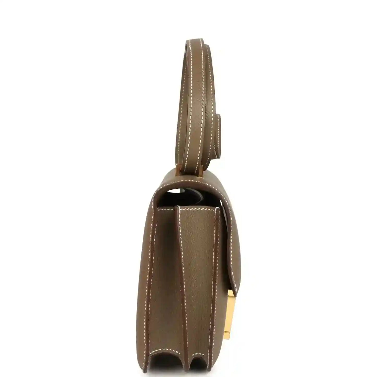 Etoupe Constance 18 crossbody bag side view with leather handle and gold hardware