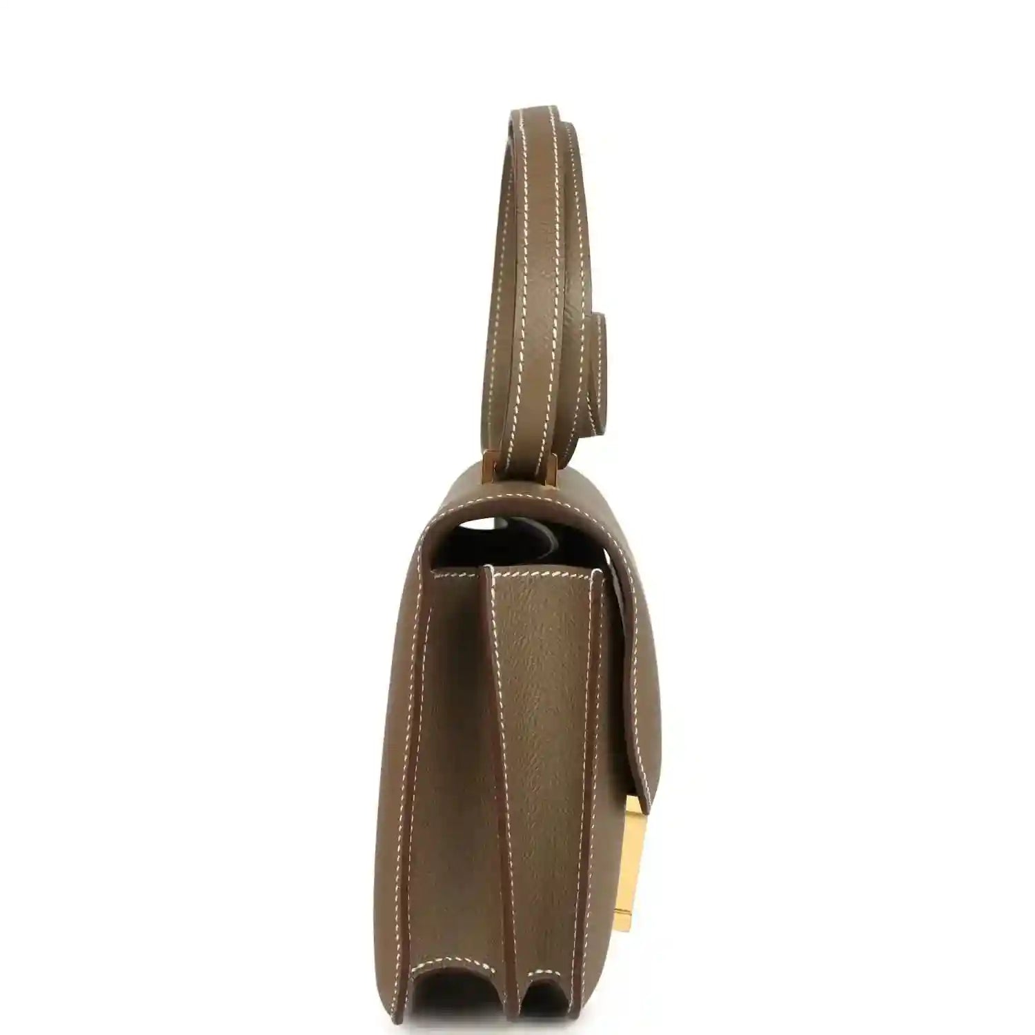 Etoupe Constance 18 crossbody bag side view with leather handle and gold hardware