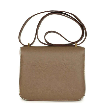 Etoupe Constance 18 crossbody bag back view with long strap and stitched edges