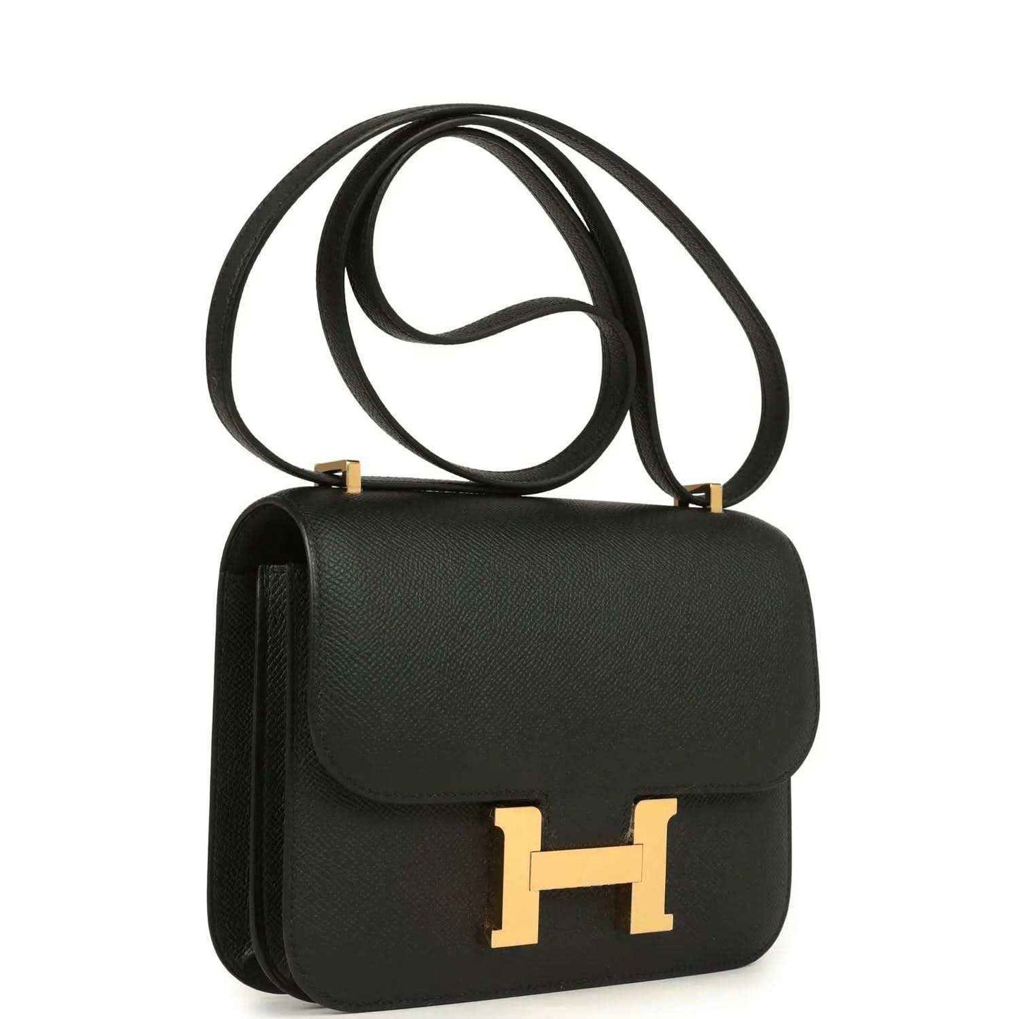Black crossbody handbag with gold-tone H clasp, side profile, textured leather.