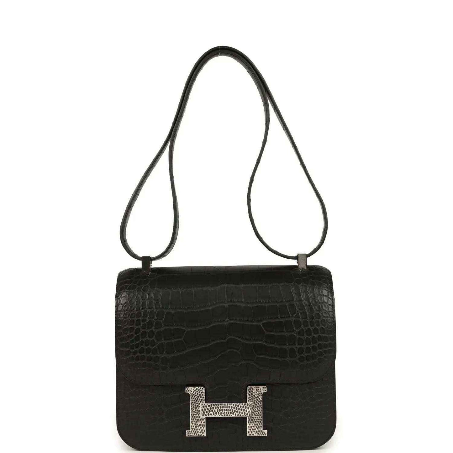 Black crocodile-pattern flap bag with gold H clasp and crossbody strap