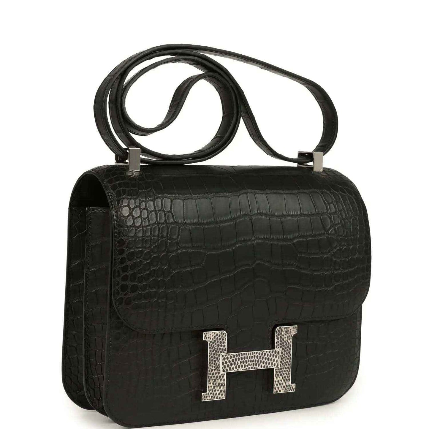 Black crocodile-pattern flap bag with gold H clasp and shoulder strap