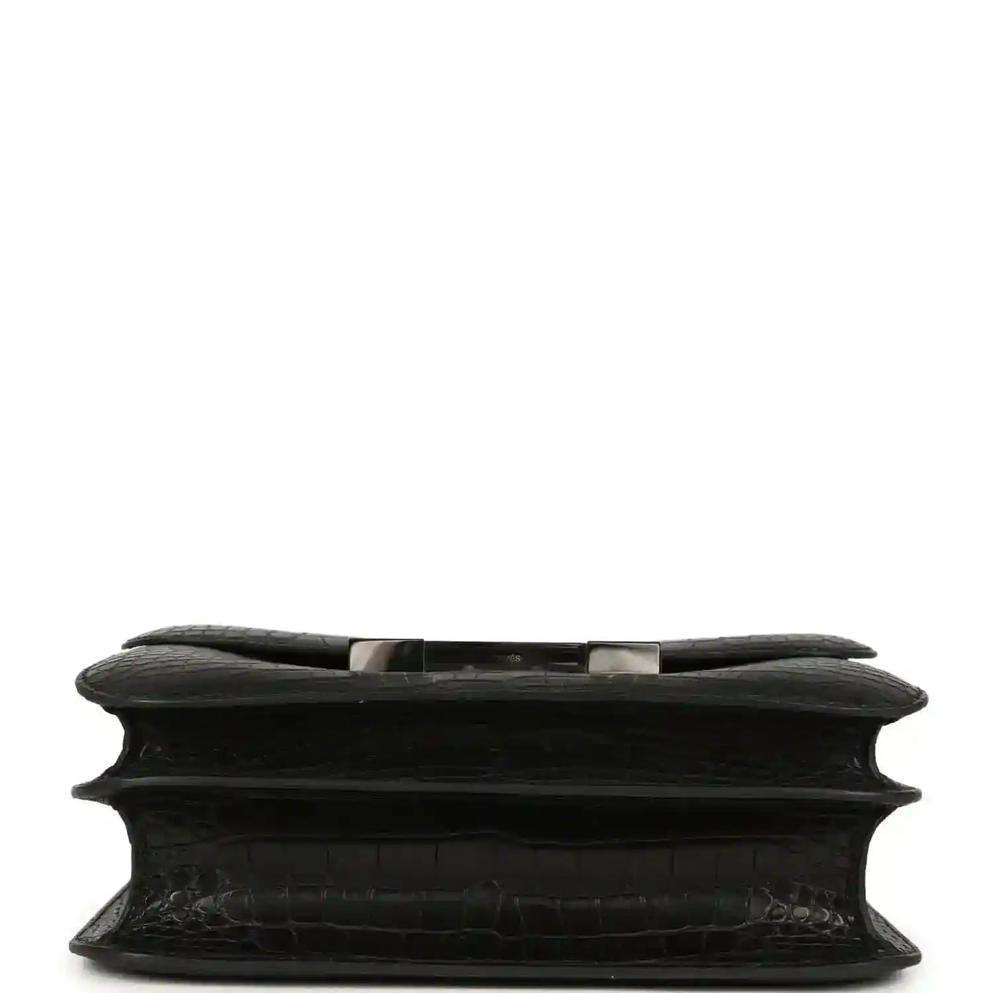 Black crocodile-pattern bag underside with structured edge