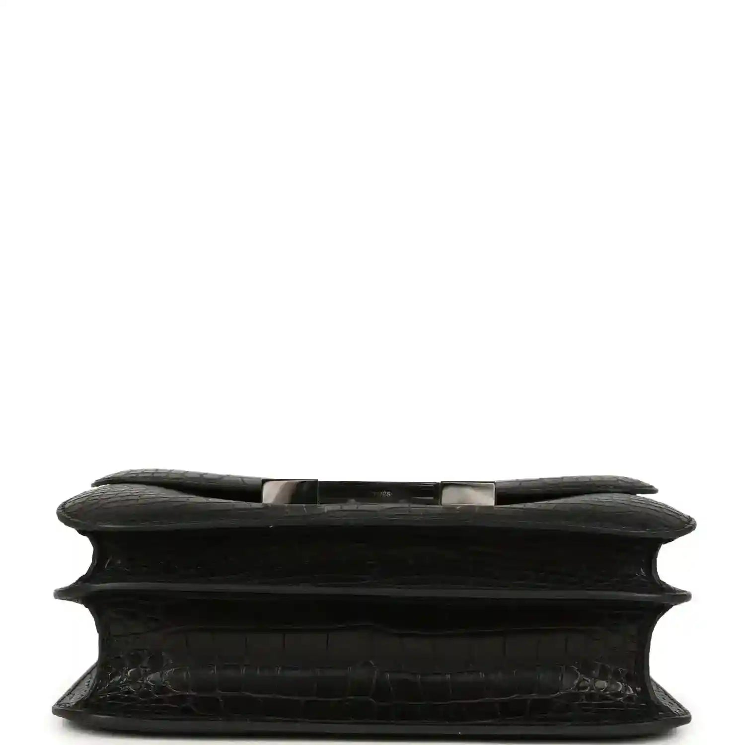 Black crocodile-pattern bag underside with structured edge