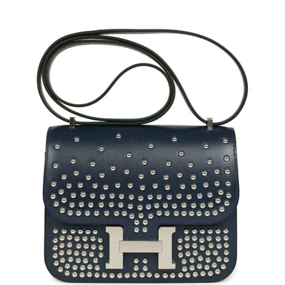 Studded blue leather flap crossbody bag with H clasp and palladium-tone hardware