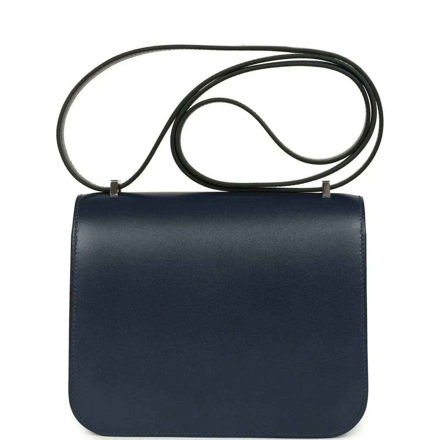 Navy-blue leather flap crossbody bag with long strap and no studded front