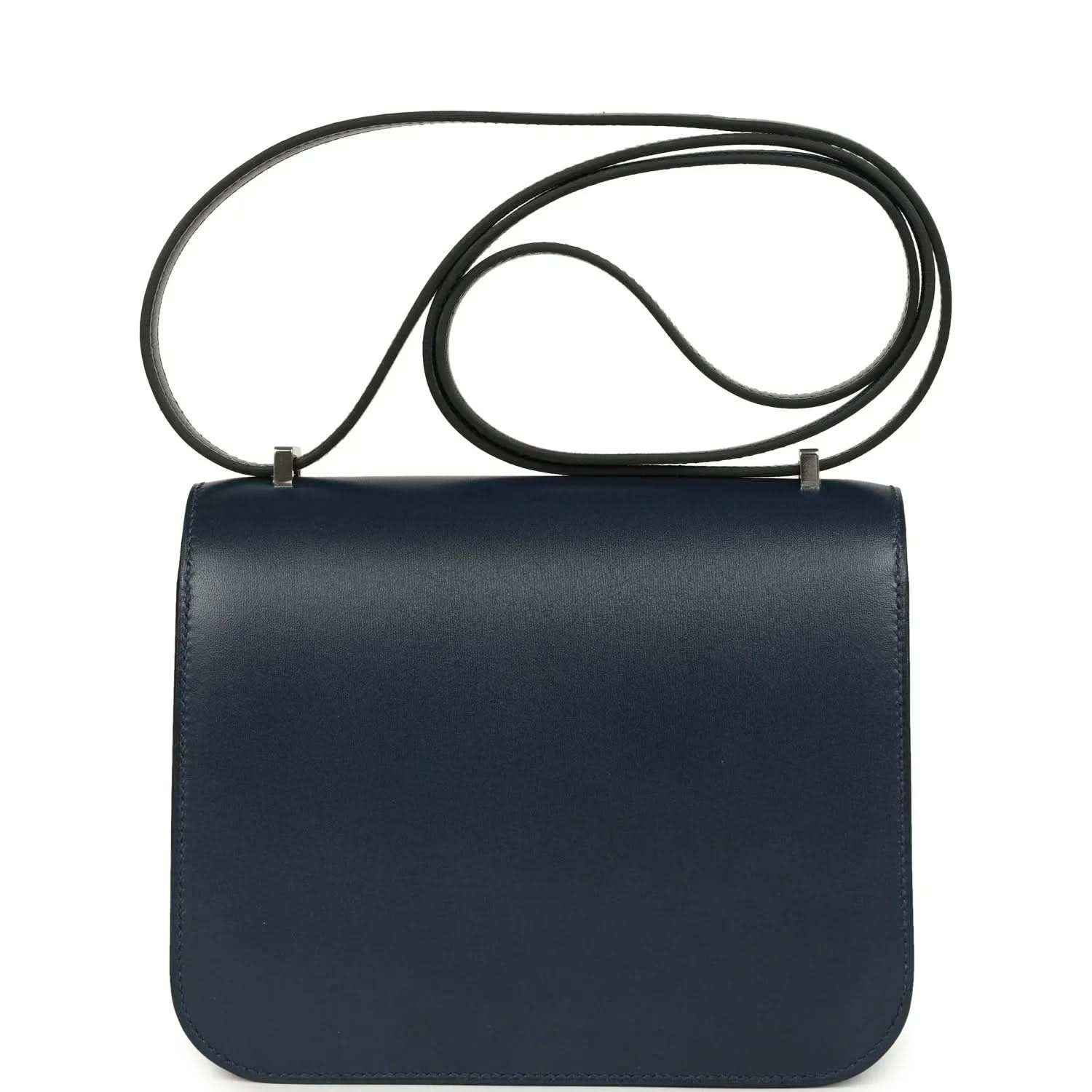 Navy-blue leather flap crossbody bag with long strap and no studded front