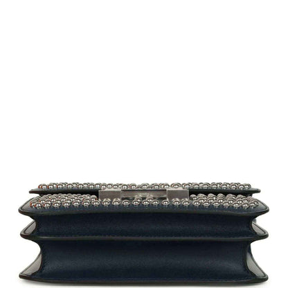 Blue leather bag base with studded edge and raised trim, silver-tone hardware