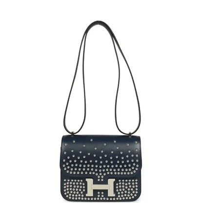 Blue studded leather shoulder bag with H clasp and long thin strap